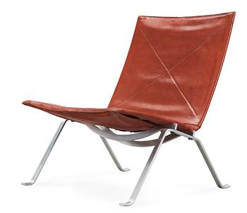 77. A Poul Kjaerholm 'PK-22' steel and leather easy chair, E Kold Christensen, Denmark.