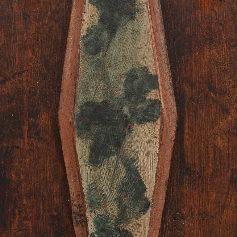 A corner cabinet, 18th Century.