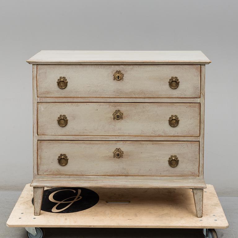 A mid 19th century painted chest of drawers.