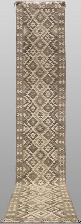 A Kelim runner, c. 465 x 86 cm.