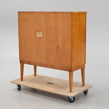 A birch wood veneered cabinet, first half of the 20th Century.