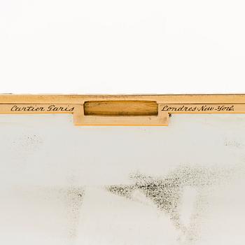 A CARTIER VANITY CASE, 18K gold, enamel, baguette cut diamond. France 1930s.