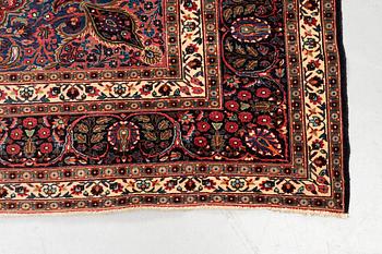 A carpet, semi-antique Mashad/Moud, ca 292 x 214 -218 cm.