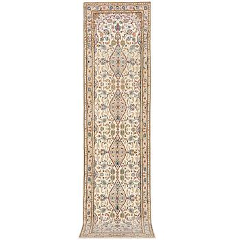 A Kashan runner carpet, c. 344 x 81 cm.