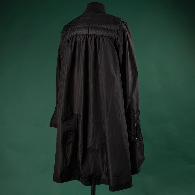 A jacket by MONCLEAR, size 3.