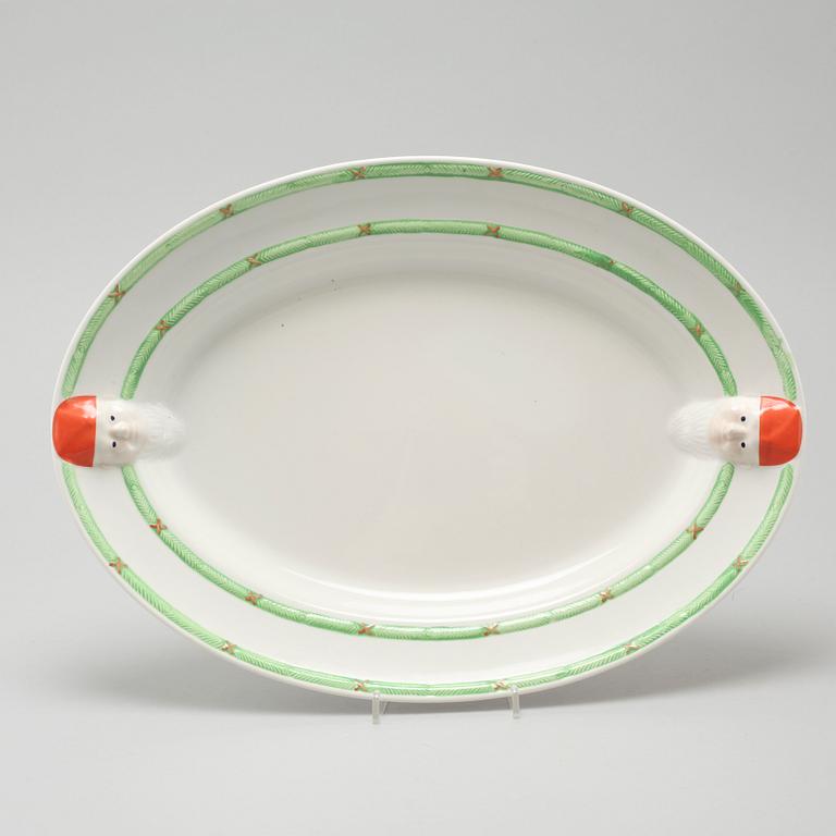 A 20th century set of earthenware tableware of 21 pcs by Gustavsberg.