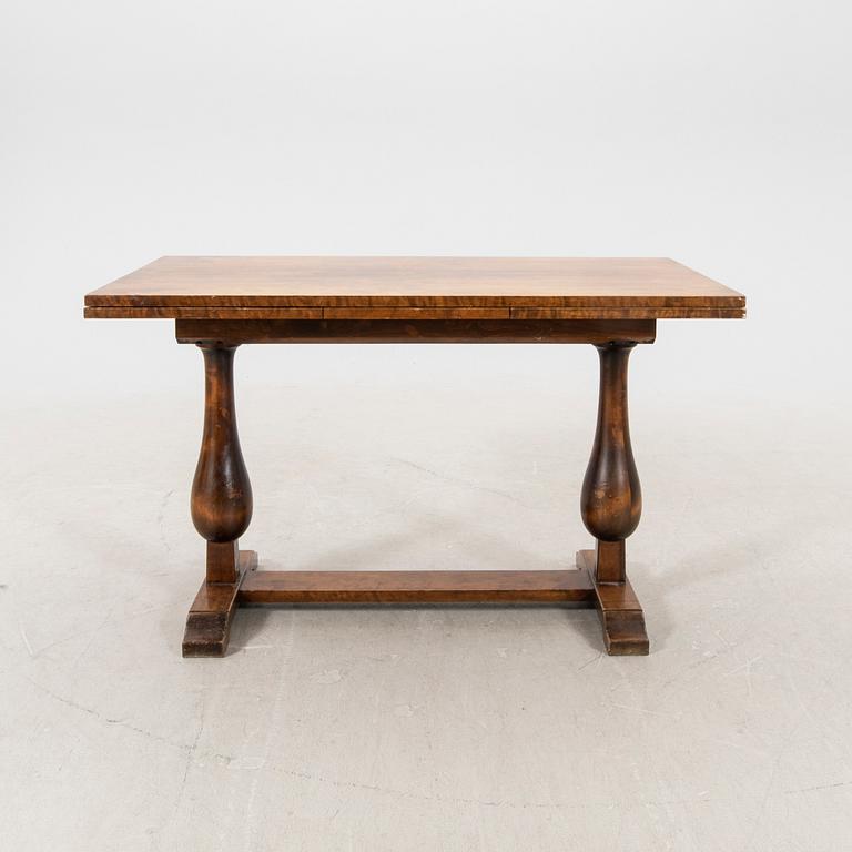 A 1940s birch dining table/library table.