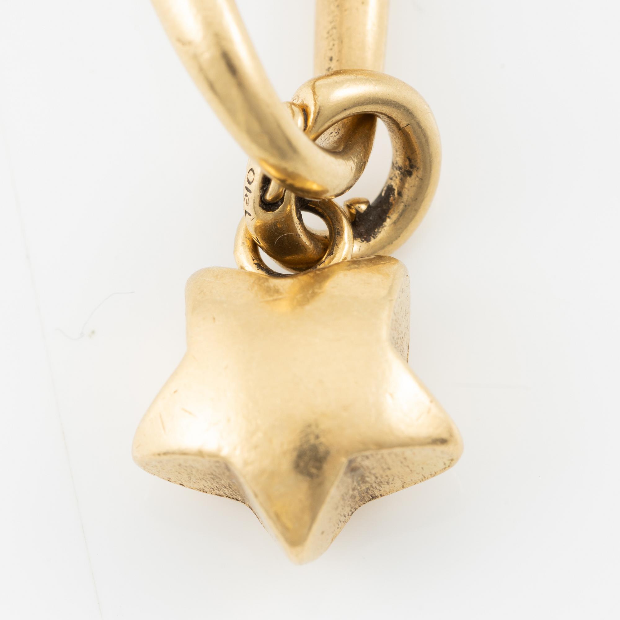 Charlotte Lynggaard, Ole Lynggaard, armband, 18K guld med berlocker i form av elefant, stjärna och hjärta.