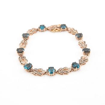 Bracelet in 14K rose gold with round brilliant-cut diamonds and oval faceted topazes, LeVian.