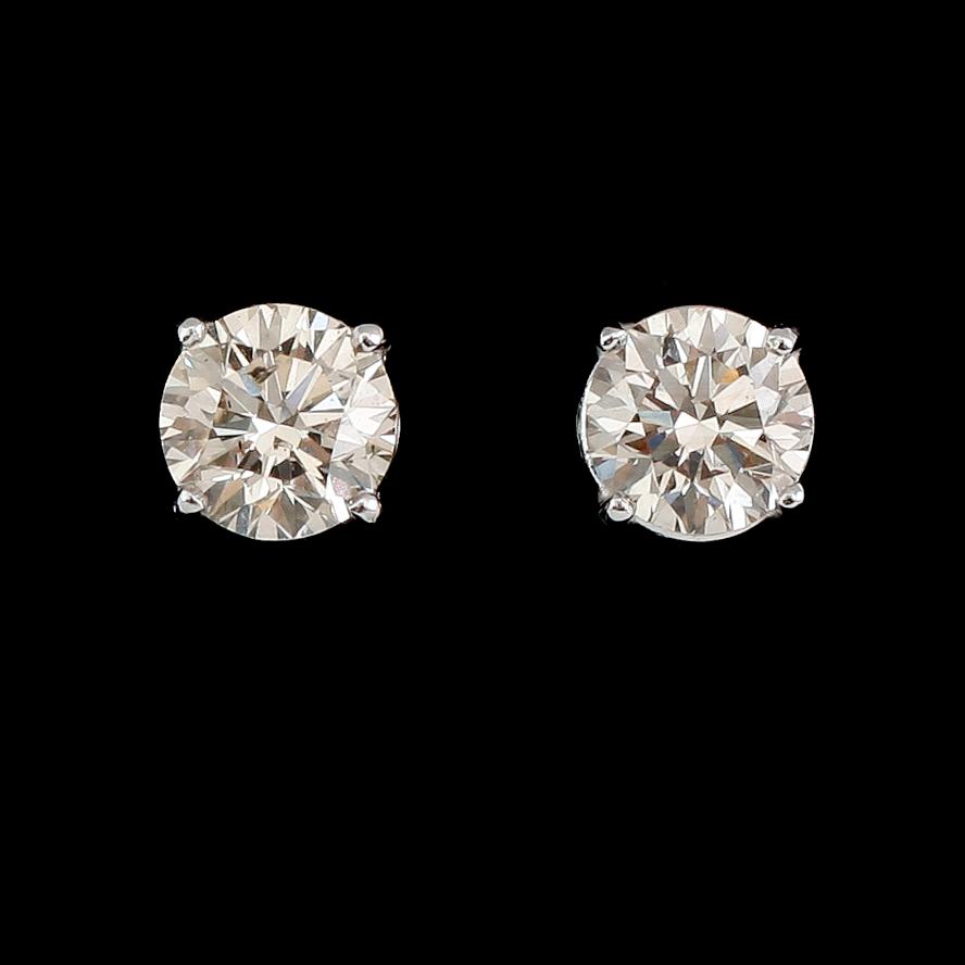 ÖRHÄNGEN, 1 par, 18 k vitguld, solitära briljantslipade diamanter tot ca 1.60 ct.