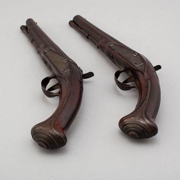 A pair of converted percussion pistols by Johan Franz Meidinger (Stockholm 1750-1769).