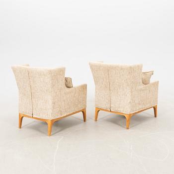 Armchairs a pair of Fogia contemporaries.