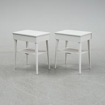 A pair of mid 20th century bedside tables.