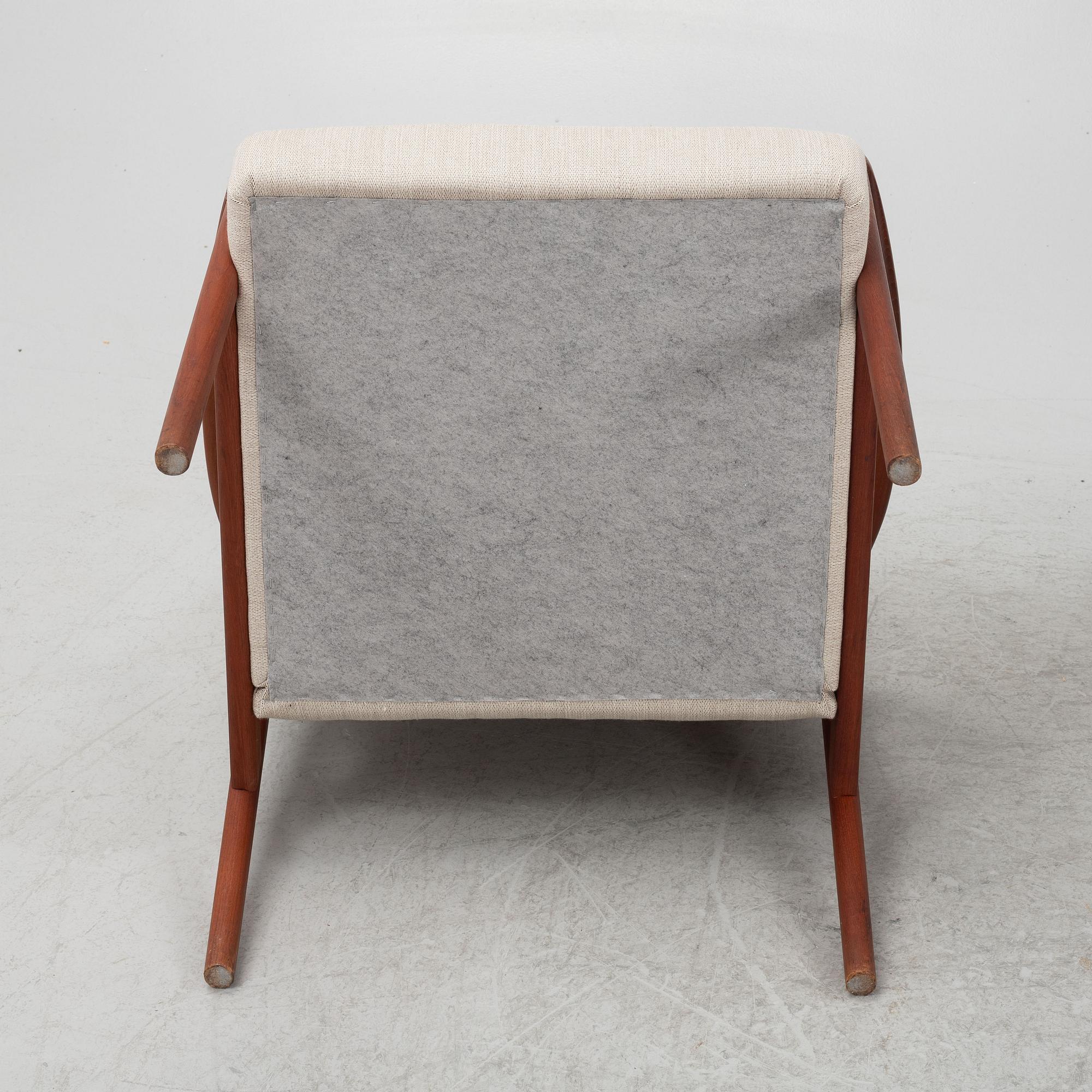 A pair of mid-century easy chairs.