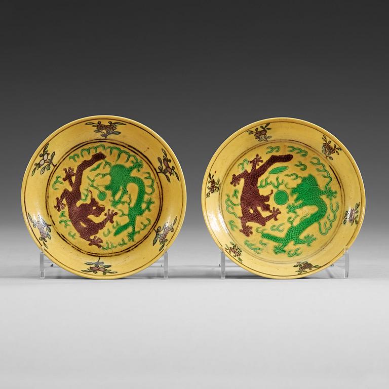 Two yellow ground dragon dishes, China, Republic 20th Century, with Guangxu six character mark.