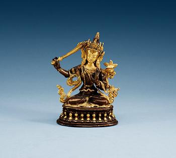 1298. A Sino-tibetan gilt copper figure of a Bodhisattva, Qing dynasty, 19th Century.
