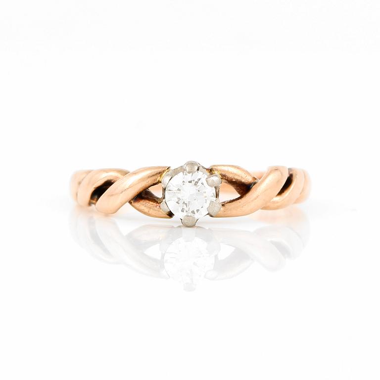 RING, 18 k guld, med briljantslipad diamant, ca 0,21 ct. Totalvikt ca 5 gram.