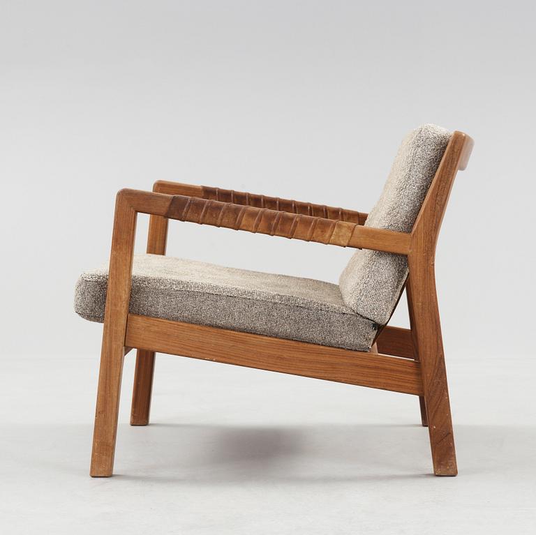 A Carl Gustaf Hiort af Ornäs walnut easy chair, Finland 1950's.