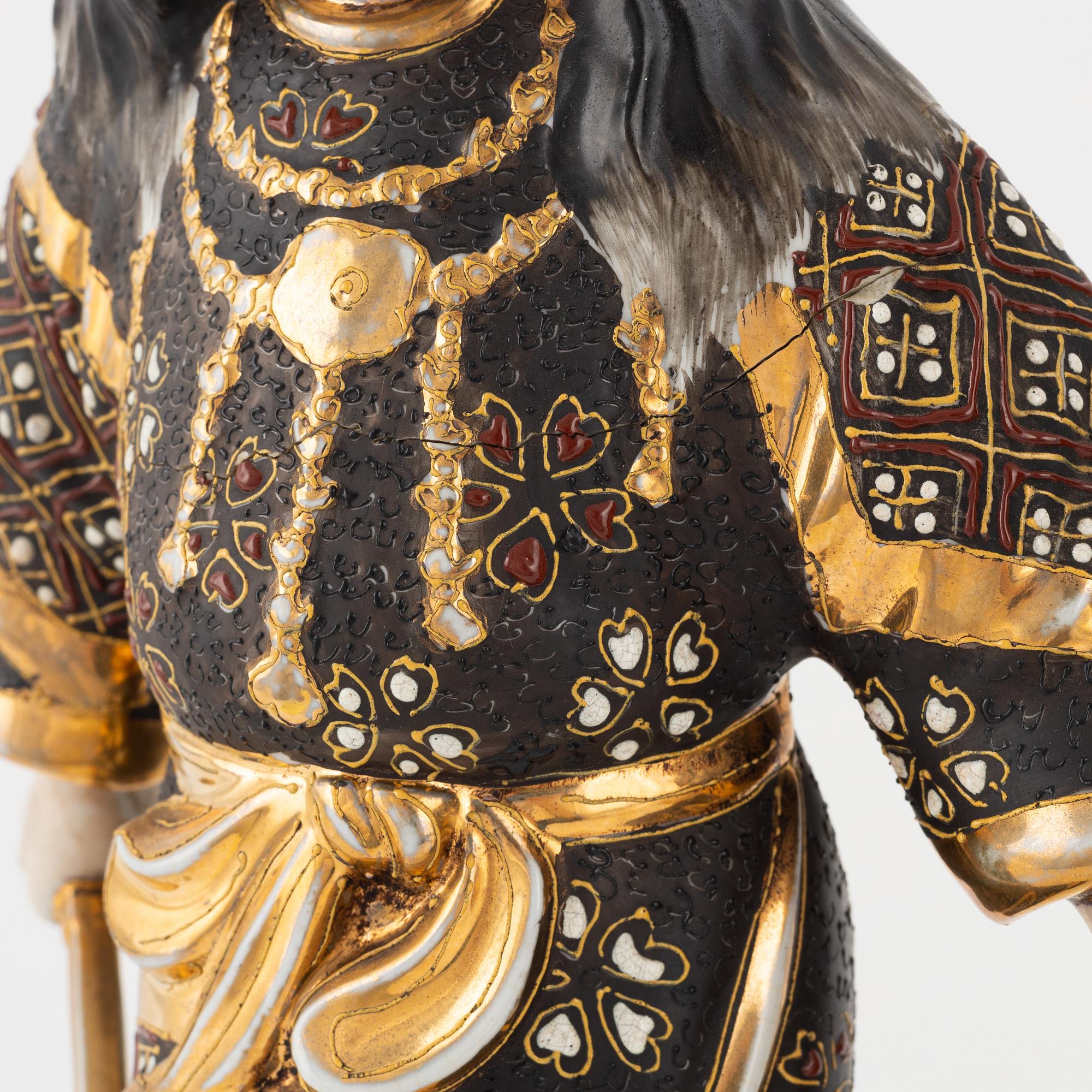 A pair of Japanese porcelain figurines, 20th century,