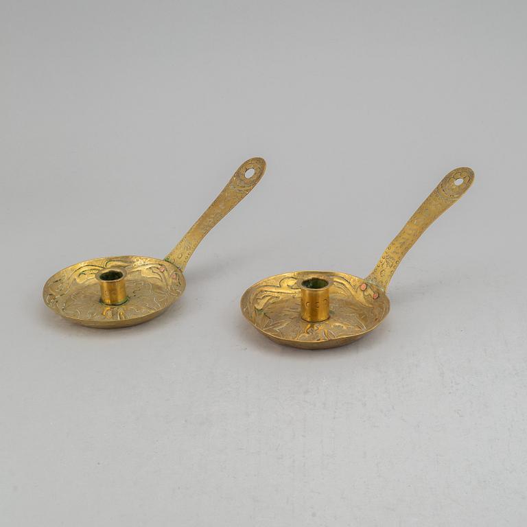 A pair of 19th century brass night light holders.