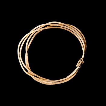 ARMKED, 18K guld. Uno a Erre. Vikt ca 29,5 g.