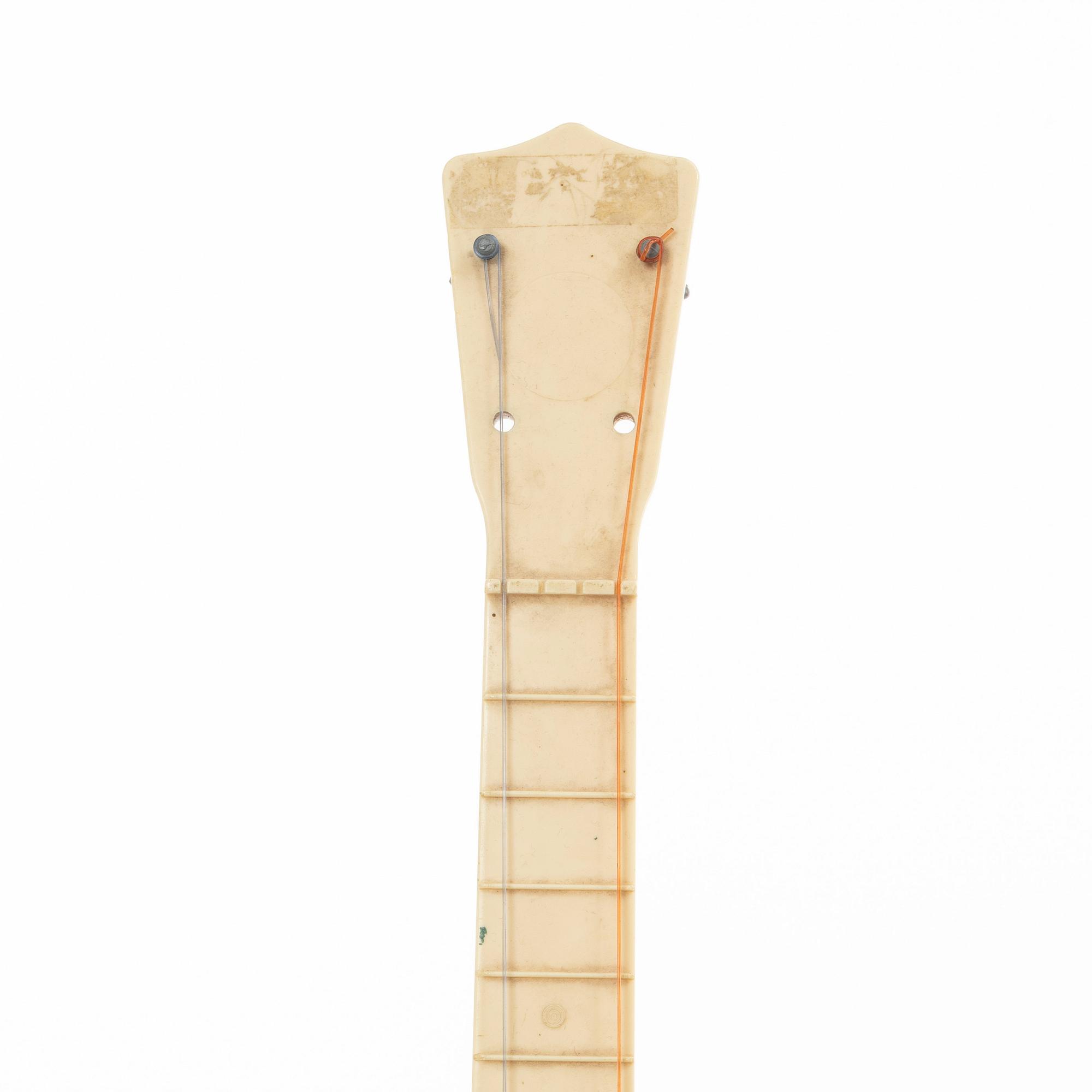 The Beatles, "New Sound Guitar", toy guitars, 2 pcs, Selcol Products Limited, England. 1960s.