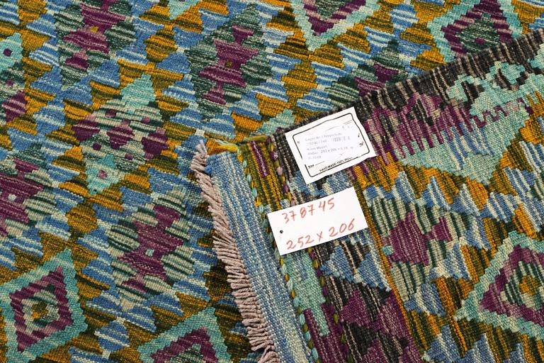 A Kilim carpet, Afghanistan, c. 252 x 206 cm.