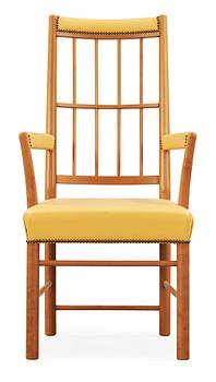 328. A Josef Frank cherry and yellow leather armchair, Svenskt Tenn, model 652.