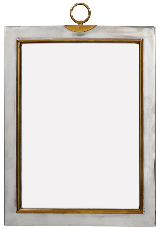 A Firma Svenskt Tenn pewter and brass wall mirror, Stockholm 1959.