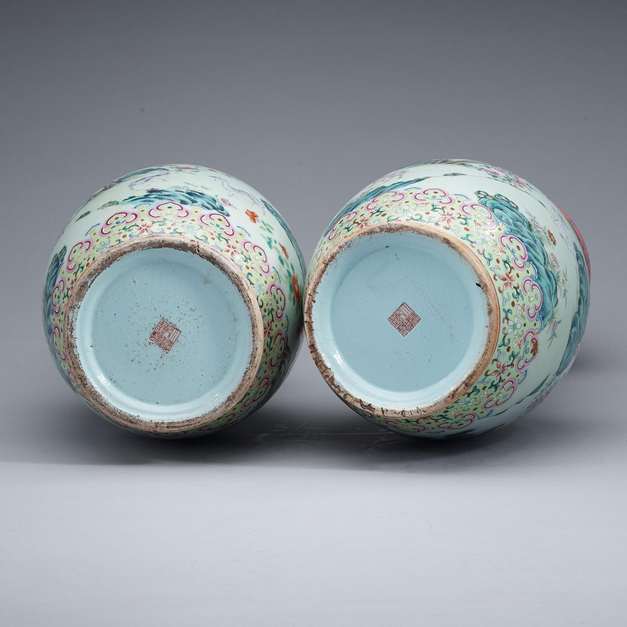 A pair of famille rose vases, Qing dynasty with Qianlong seal mark.