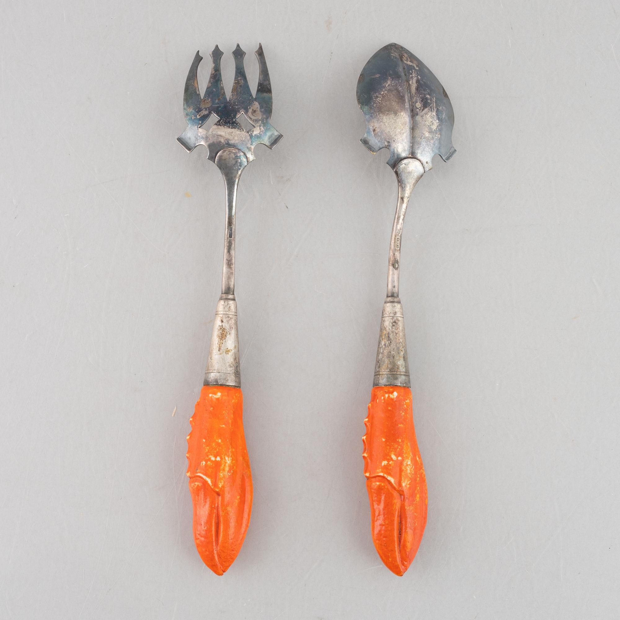 Two crayfish bowls, along with serving utensils and a carafe, late 19th to first half of the 20th Century.