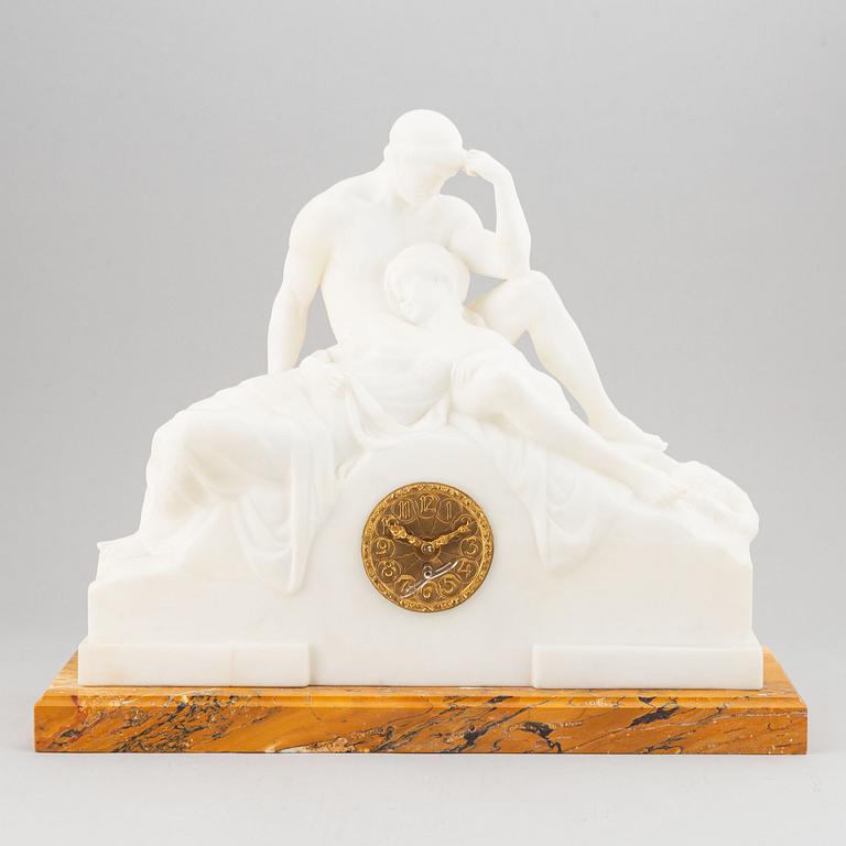 An alabaster mantle clock from the second half of the 19th-century.
