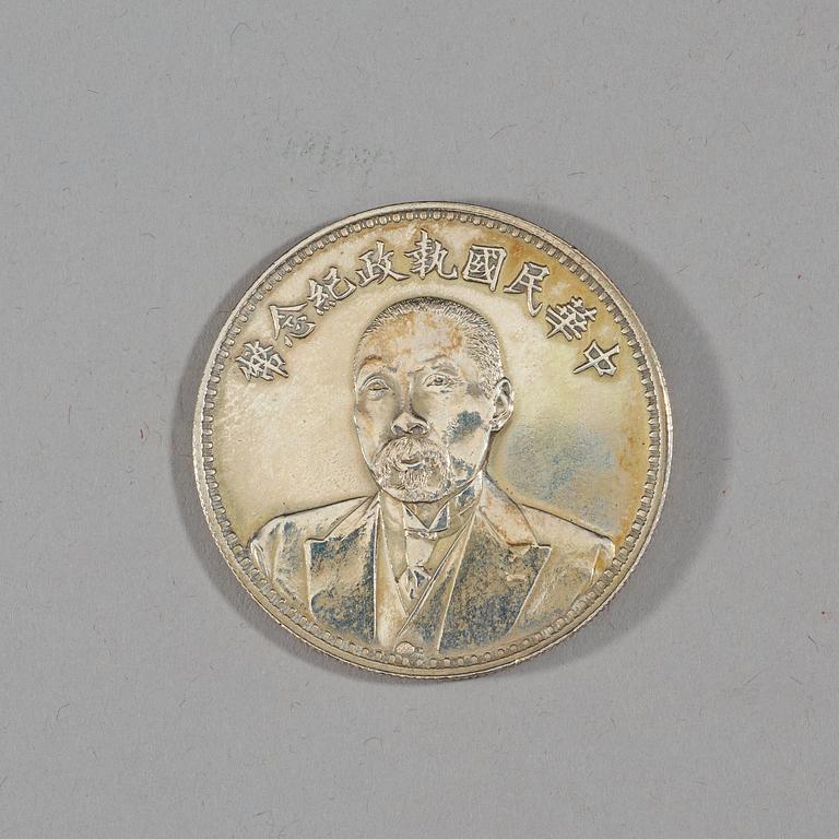 A box with five silver coins, Republic, early 20th Century.