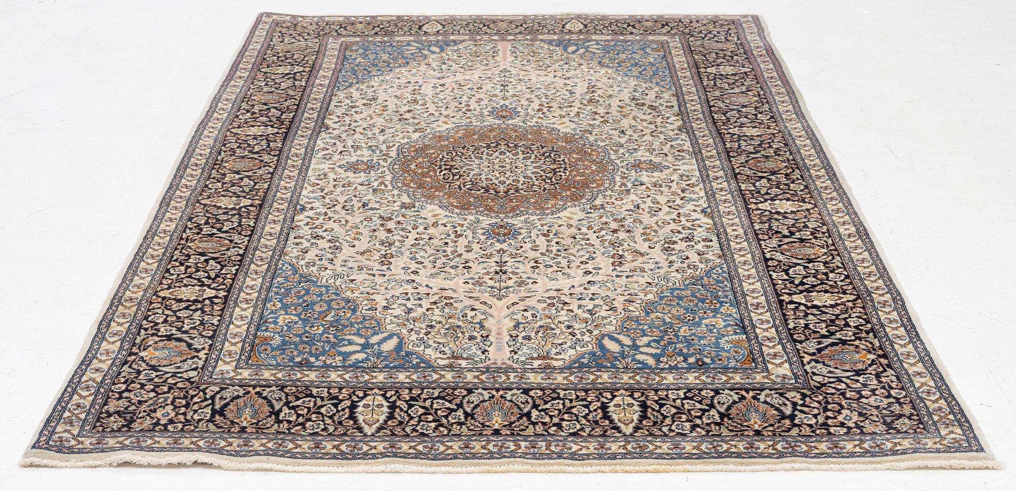 A oriental rug, c. 260 x 155 cm.