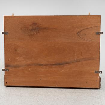 A mahogany panel, 20th century.