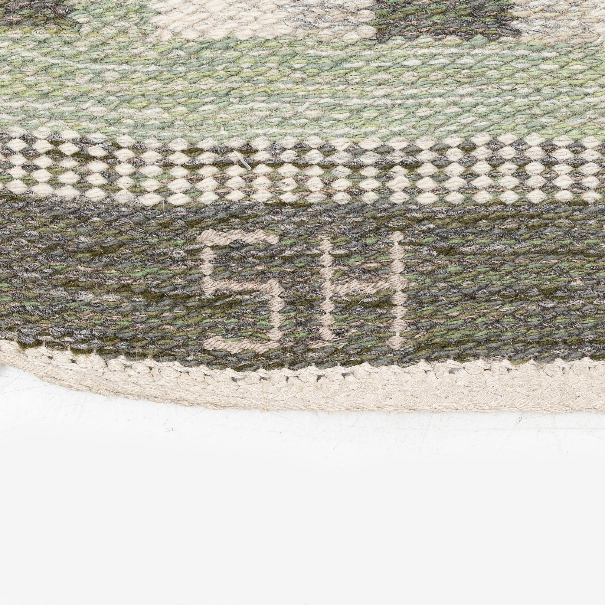 Edna Martin, a flat weave runner, c. 335 x 104 cm signed SH EM.