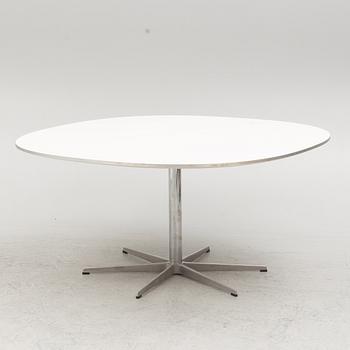 Arne Jacobsen, Bruno Mathsson & Piet Hein, a 'Super circle' dining table, Fritz Hansen, Denmark, 2007.