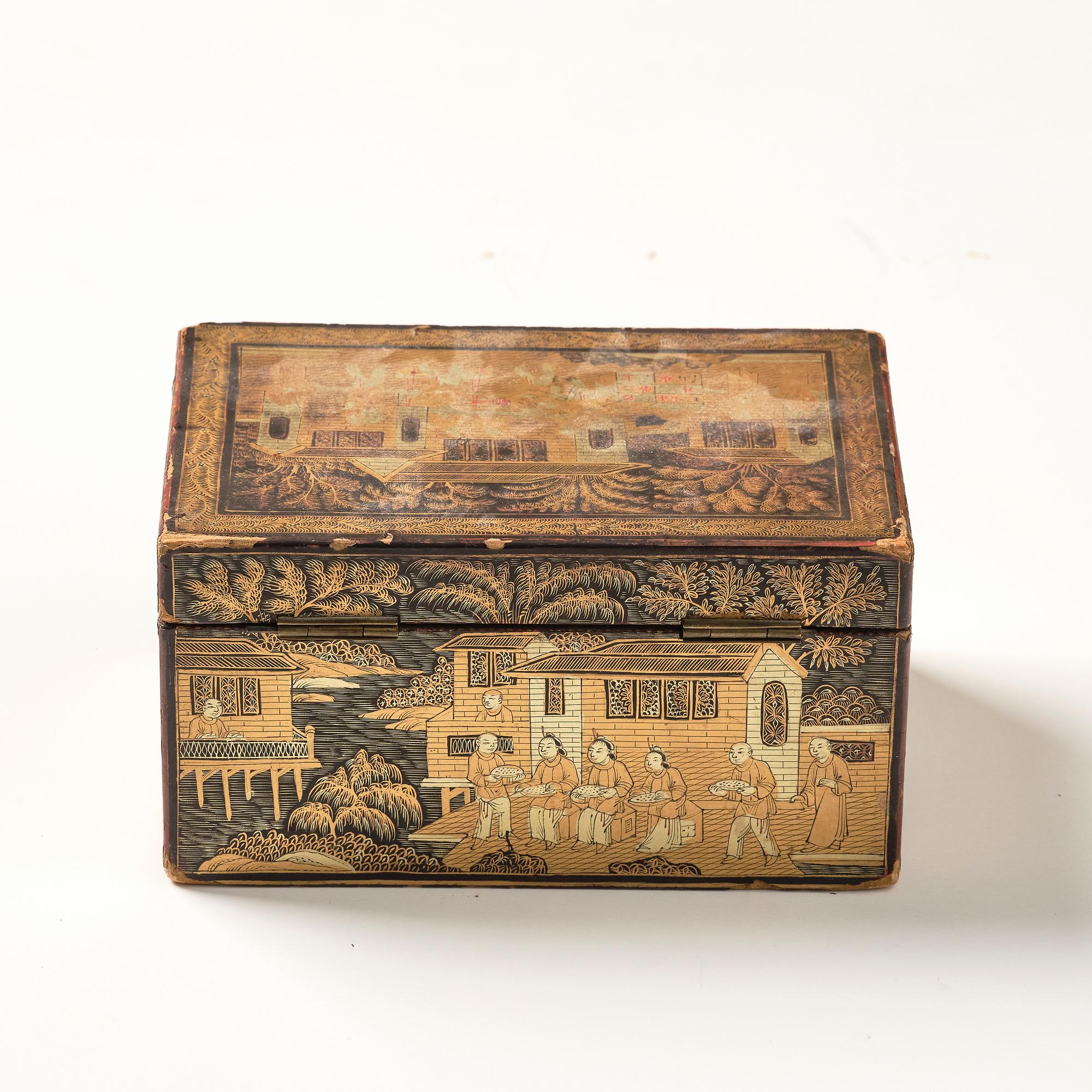 A lacquer tea box and a blanc de chine cup, Qing dynasty 18/19th century.