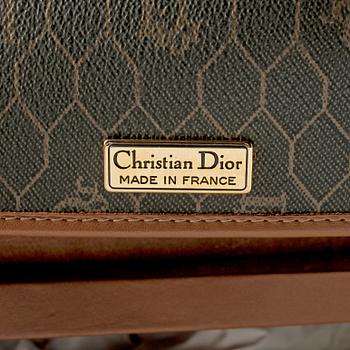 CHRISTIAN DIOR, a treated monogram canvas bag.