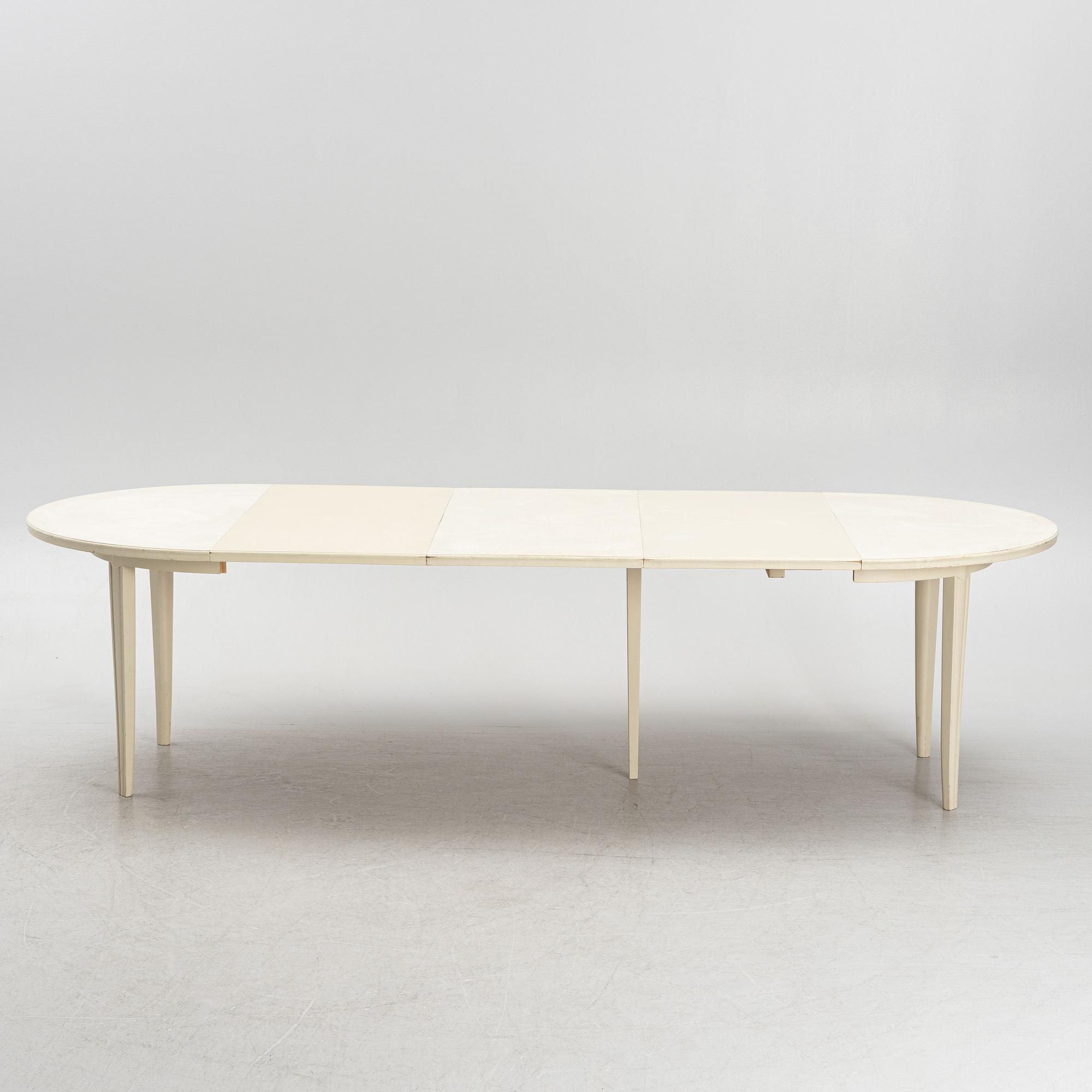 Carl Malmsten, six 'Juni' chairs and a dining table, second half of the 20th Century.