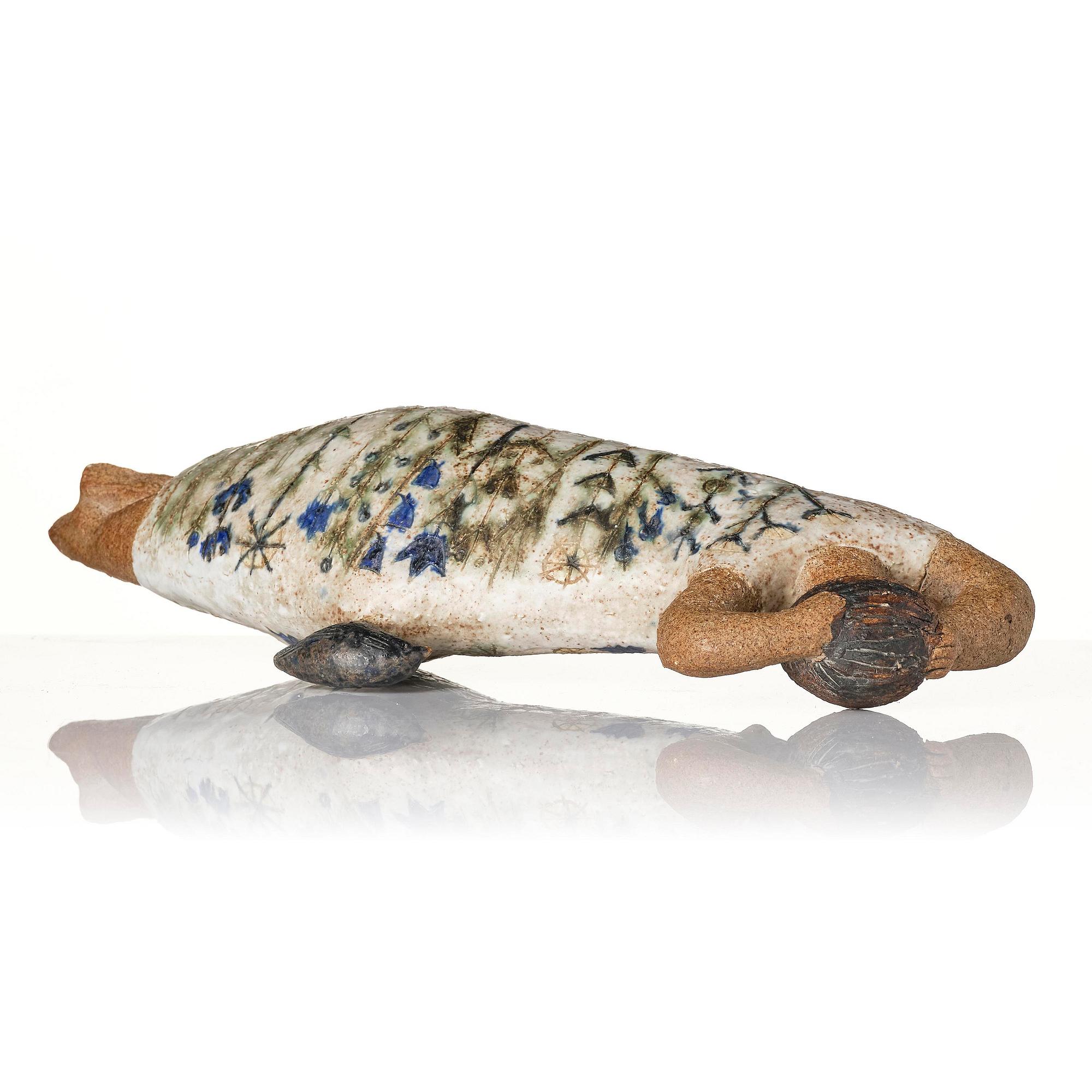 Lisa Larson, a unique chamotte stoneware sculpture of a reclining female figure with a bird, Gustavsberg Studio, probably 1950s-60s.