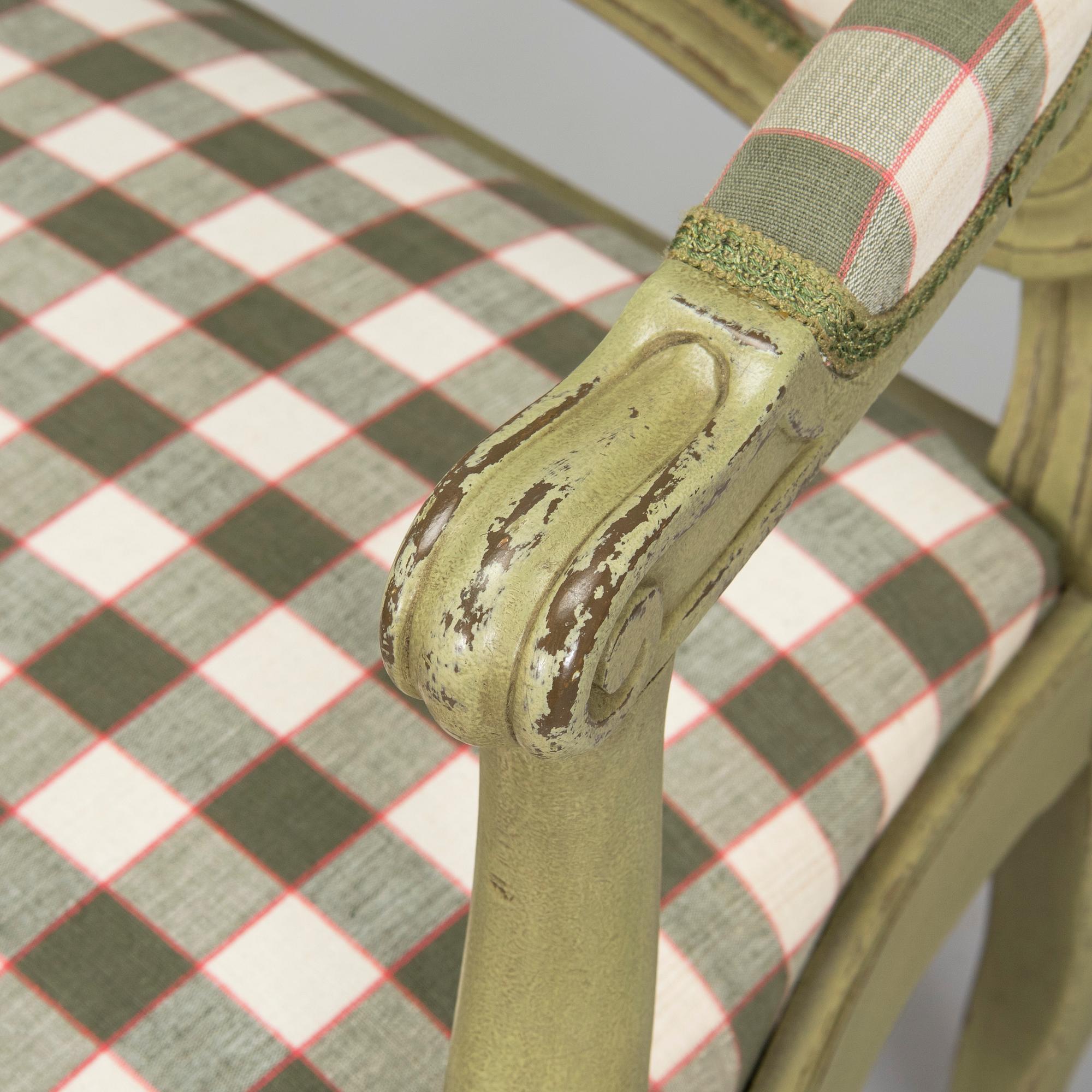 A pair of 20th century  Rococo style armchairs.