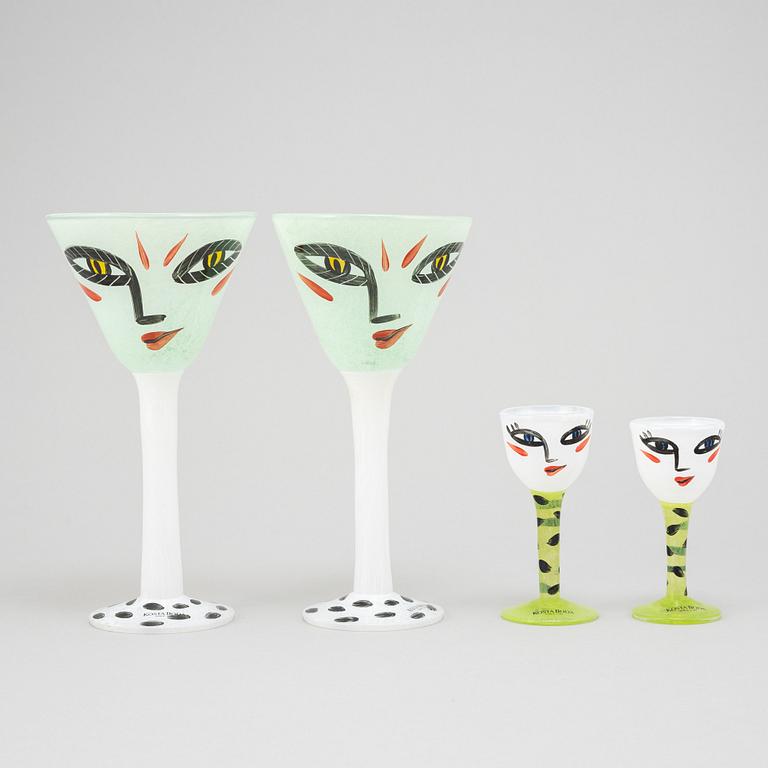 Ulrica Hydman-Vallien, a glass vase, goblet, and six glasses from Kosta Boda, signed and numbered.