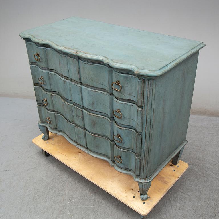 a baroque style chest of drawers from the 19th century.