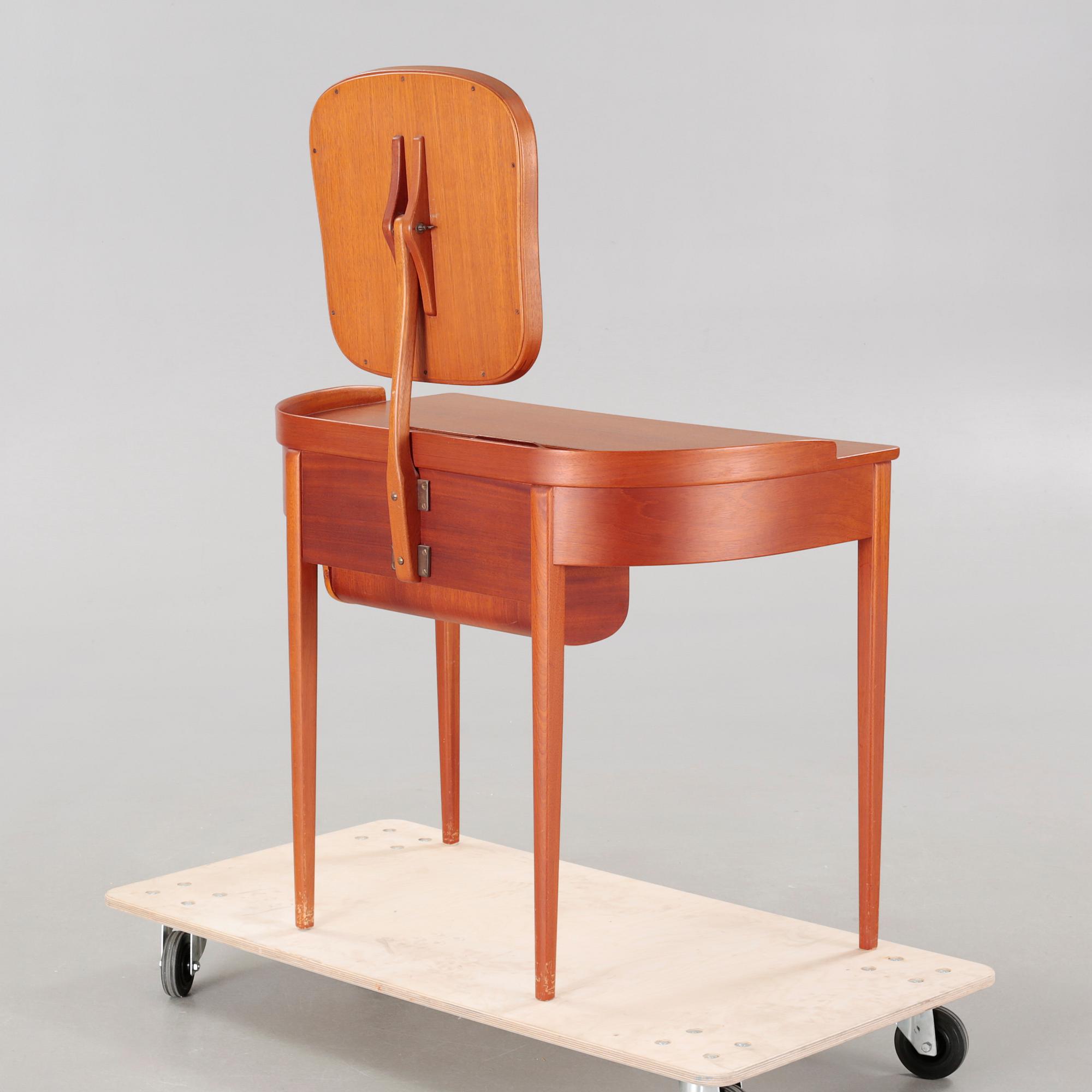 a table with mirror "Birgitta" veneered with teak designed by Carl Malmsten for Bodafors Möbelfabrik,