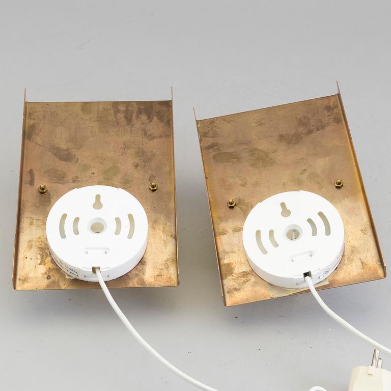 A pair of wall lights marked Fred L. Thiesen, 20th century.