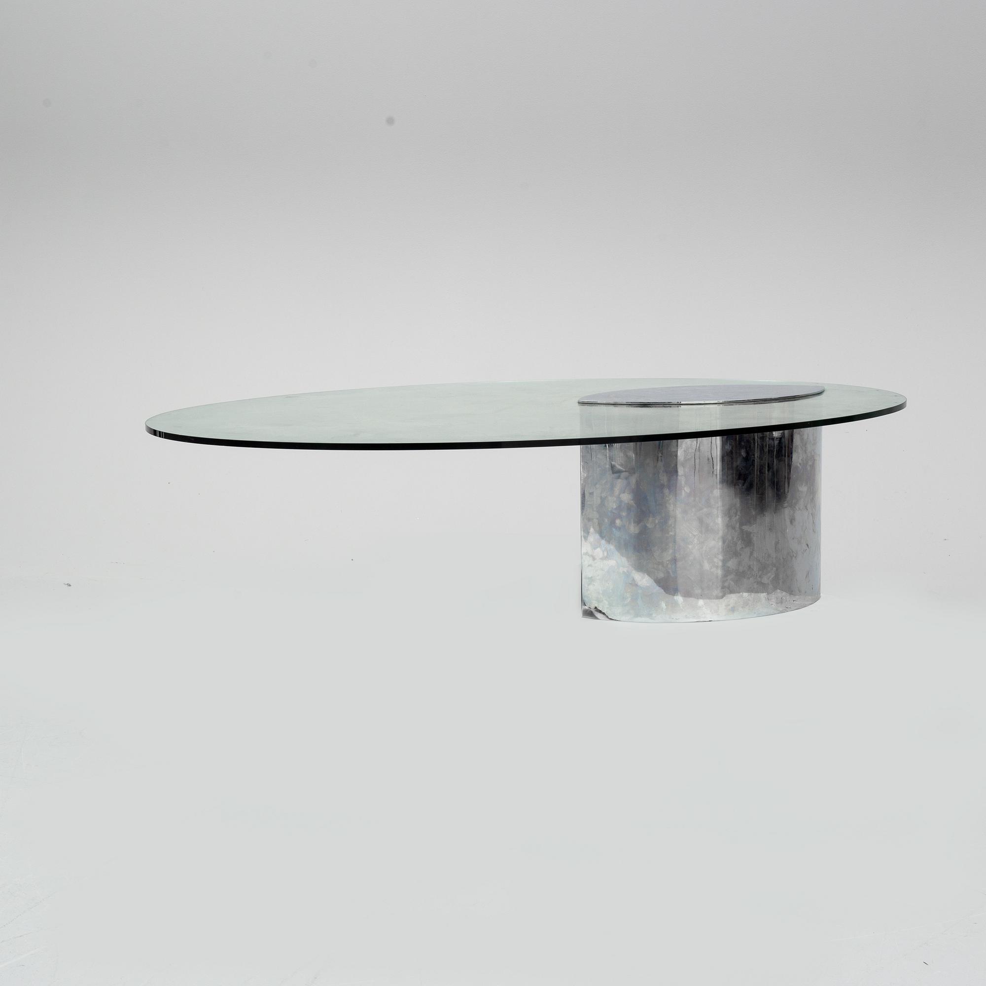 A GLASS TOP COFFEE TABLE "LUNARIO" CINI BOERI.