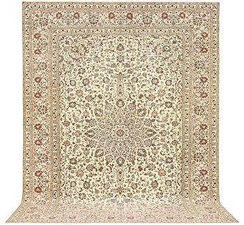 A Kashan carpet, a. 405 x 295 cm.
