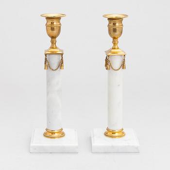 A pair of late 19th-century candlesticks.