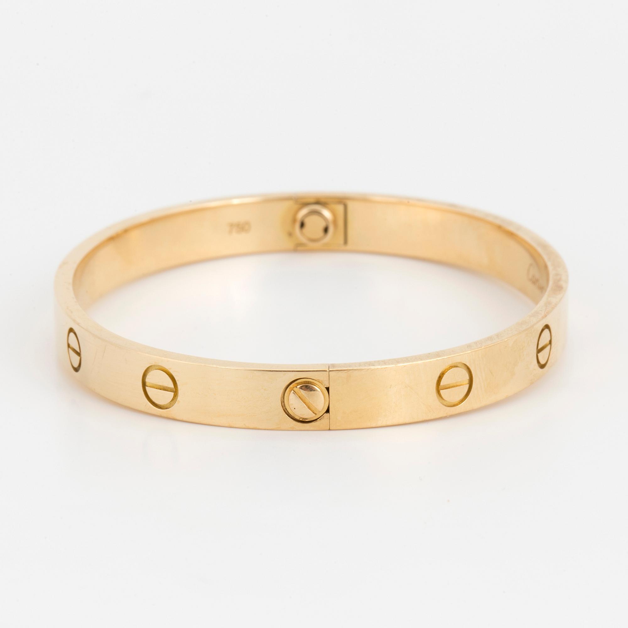 An 18K gold Cartier 'Love' bangle.
